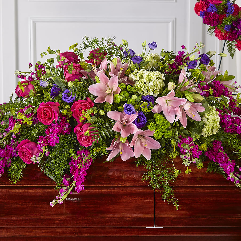 Radiant Tribute Casket Spray – Exquisite Flowers, Freeport FL